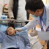 Bé trai đang điều trị tại Bệnh viện Việt Nam-Cuba. (Ảnh: PV/Vietnam+)