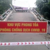 Khu vực tổ 10 và tổ 14, ấp Bình Trung, xã Bình Phước Xuân, huyện Chợ Mới, tỉnh An Giang - nơi bệnh nhân 2606 tái dương tính với SARS-CoV-2 bị tạm thời phong tỏa. (Ảnh: Công Mạo/TTXVN)