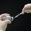 Các loại vaccine phòng COVID-19 sử dụng tại Việt Nam phải được Bộ Y tế cấp phép. (Ảnh: THX/TTXVN)