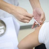 Tiêm vaccine phòng COVID-19 cho các đối tượng tại Việt Nam. (Ảnh: Minh Sơn/Vietnam+)