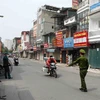 Hà Nội tăng cường kiểm soát người tham gia giao thông tại nhiều tuyến phố. (Ảnh: Trần Việt/TTXVN)