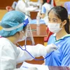 Đà Nẵng triển khai tiêm vaccine phòng COVID-19 cho đối tượng dưới 18 tuổi. (Ảnh: Văn Dũng/TTXVN)