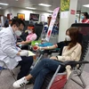 Nhiều người tham gia hiến máu tại Lễ hội Xuân hồng. ( Ảnh: T.G/Vietnam+)