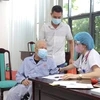 Thăm khám, tư vấn sức khoẻ cho người bệnh tại Bệnh viện Đa khoa Đức Giang. (Ảnh: PV/Vietnam+)