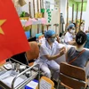 Kinh nghiệm của Việt Nam qua nhiều đợt dịch là tăng cường sự tiếp cận của y tế cơ sở. (Ảnh: TTXVN/Vietnam+)