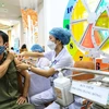 Việt Nam là một trong số những quốc gia có tỷ lệ tiêm vaccine phòng COVID-19 cao nhất thế giới. (Ảnh: TTXVN/Vietnam+)