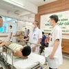 Bệnh nhân cấp cứu được chuyển tới Bệnh viện Hữu nghị Việt Đức. (Ảnh: PV/Vietnam+)