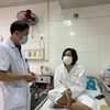 Bệnh nhân V.T.Y chia sẻ sau phẫu thuật bàn tay đã trở nên khô, không còn đổ mồ hôi. (Ảnh: PV/Vietnam+) 