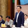 Phó Thống đốc Ngân hàng Nhà nước Phạm Thanh Hà trả lời các câu hỏi của phóng viên. (Ảnh: Phạm Kiên/TTXVN)