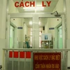 Giám sát hoạt động cách ly, điều trị bệnh nhân COVID-19 tại Khoa Bệnh Nhiệt đới, Bệnh viện Chợ Rẫy Thành phố Hồ Chí Minh. (Ảnh: Đinh Hằng/TTXVN)