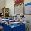 Nhân viên y tế tại tuyến y tế cơ sở. (Ảnh: Thùy Giang/Vietnam+)