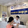 Người dân đến khám tại Phòng khám Đa khoa và Khám bệnh nghề nghiệp tại địa chỉ 35 Lê Văn Thiêm, Thanh Xuân Hà Nội. (Ảnh: T.G/Vietnam+)