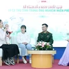 Chị Nguyễn Thị Yến chia sẻ về hành trình được làm mẹ. (Ảnh: PV/Vietnam+)
