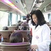 [Photo] Gần 400 bệnh nhân và người nhà được về quê trên các chuyến xe miễn phí 