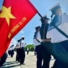 Lễ chào cờ ở Đảo Trường Sa thật đặc biệt.(Ảnh: Nguyễn Trần Tùng/Vietnam+)