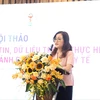 Bà Trần Thị Trang - Vụ trưởng Vụ Bảo hiểm Y tế (Bộ Y tế) phát biểu tại hội thảo. (Ảnh: PV/Vietnam+)