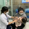 Tiêm vaccine phòng bệnh sởi cho trẻ em. (Ảnh: Đinh Hằng/TTXVN)