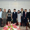 Đoàn đại biểu cấp cao Trung ương Đoàn thanh niên cộng sản Cuba trong chuyến thăm và làm việc tại Thành phố Hồ Chí Minh. (Ảnh: Thanh Vũ/TTXVN)