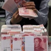 Mỹ muốn Trung Quốc điều chỉnh chính sách tiền tệ và sở hữu trí tuệ