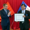 Pháp tặng Huân chương cho ông Nguyễn Văn Mễ và ông Bửu Ý