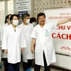 Bộ trưởng Bộ Y tế Nguyễn Thị Kim Tiến giám sát công tác chuẩn bị phòng chống dịch MERS tại Bệnh viện Bệnh Nhiệt đới Trung ương (Hà Nội). (Ảnh: Dương Ngọc/TTXVN)