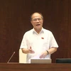 Chủ tịch Quốc hội Nguyễn Sinh Hùng điều khiển phần chất vấn và trả lời chất vấn. (Ảnh: Nhan Sáng/TTXVN)
