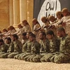 Cảnh hành quyết binh lính Syria tại nhà hát cổ ở thành phố Palmyra. (Nguồn: independent.ie)