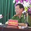 Đại tá Nguyễn Hữu Cầu, Giám đốc Công an Nghệ An, chủ trì họp báo. (Ảnh: Nguyễn Văn Nhật/TTXVN)