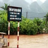 Lũ dâng cao báo động 2 tại xã Chiềng Khoang, huyện Quỳnh Nhai, Sơn La. (Ảnh: Điêu Chính Tới/TTXVN)