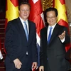 Thủ tướng Nguyễn Tấn Dũng và Thủ tướng Anh David Cameron. (Ảnh: Đức Tám/TTXVN)