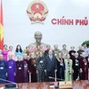 Phó Thủ tướng Nguyễn Xuân Phúc chụp ảnh chung với các đại biểu. (Ảnh: Phương Hoa/TTXVN)