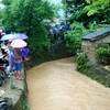 Khu vực chị Mai bị mất tích do nước cuốn. (Ảnh: Nguyễn Hoàng/Vietnam+)
