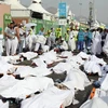 Thi thể các nạn nhân thiệt mạng trong vụ giẫm đạp. (Nguồn: AFP/TTXVN)