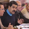 Tổng thống Venezuela Nicolas Maduro (thứ 2, trái) chủ trì cuộc họp với các Bộ trưởng Chính phủ tại Caracas. (Nguồn: AFP/TTXVN)