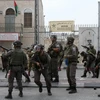 Lực lượng an ninh Israel được triển khai để đối phó với người biểu tình Palestine tại Bethlehem, Khu Bờ Tây. (Nguồn: AFP/TTXVN)