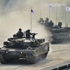 Xe tăng K1A1 của quân đội Hàn Quốc chuẩn bị cho Triển lãm Vũ trụ và Quốc phòng Quốc tế Seoul. (Nguồn: AFP/TTXVN)