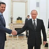 Tổng thống Nga Vladimir Putin và Tổng thống Syria Bashar al-Assad (Nguồn: AFP/TTXVN)