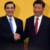 Chủ tịch Trung Quốc Tập Cận Bình bắt tay người đứng đầu chính quyền Đài Loan Mã Anh Cửu. (Nguồn: Getty Images