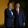Chủ tịch Trung Quốc Tập Cận Bình (phải) và Tổng thống Đài Loan Mã Anh Cửu. (Nguồn: AFP)