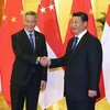Chủ tịch Trung Quốc Tập Cận Bình và Thủ tướng Singapore Lý Hiển Long. (Nguồn: straitstimes.com)