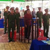 Bị cáo Trần Gia Tùng trước vành móng ngựa chờ tuyên án. (Ảnh: Phạm Thanh Tân/Vietnam+)