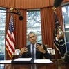 Tổng thống Mỹ Barack Obama ký một sắc lệnh tại Nhà Trắng. (Nguồn: AFP/TTXVN)