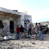 Hiện trường vụ đánh bom ở Msillata, gần thành phố Khoms của Libya. (Nguồn: THX/TTXVN)