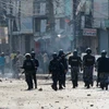 Xung đột giữa cảnh sát và người biểu tình tại Birgunj, gần biên giới Nepal-Ấn Độ. (Nguồn: AFP/TTXVN)