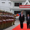Bộ trưởng Bộ An ninh Lào Somkeo Silavong tiếp Đại tướng Trần Đại Quang. (Ảnh: Phạm Kiên/Vietnam+)