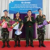 Ba sỹ quan Việt Nam lên đường làm nhiệm vụ tại Phái bộ Gìn giữ hòa bình Liên hợp quốc. (Ảnh: Hồng Pha/TTXVN)