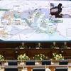 Các quan chức cấp cao Bộ Quốc phòng Nga phát biểu tại cuộc họp báo công bố các bằng chứng về tuyến vận chuyển dầu bất hợp pháp sang Thổ Nhĩ Kỳ từ các khu vực do IS kiểm soát tại Syria và Iraq. (Nguồn: AFP/TTXVN)