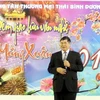 Đại sứ Đoàn Xuân Hưng chúc Tết tại Trung tâm thương mại Thái Bình Dương. (Ảnh: Mạnh Hùng/Vietnam+)