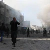 Khói bốc lên sau các cuộc không kích tại Ghouta, ngoại ô thủ đô Damascus của Syria. (Nguồn: AFP/TTXVN)