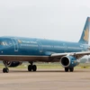 Máy bay của Vietnam Airlines chuẩn bị cất cánh tại sân bay quốc tế Nội Bài. (Ảnh: Huy Hùng/TTXVN)